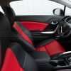 Honda Civic installed leather kit - Black & Bright Red - Headrest double-stitching and door insert