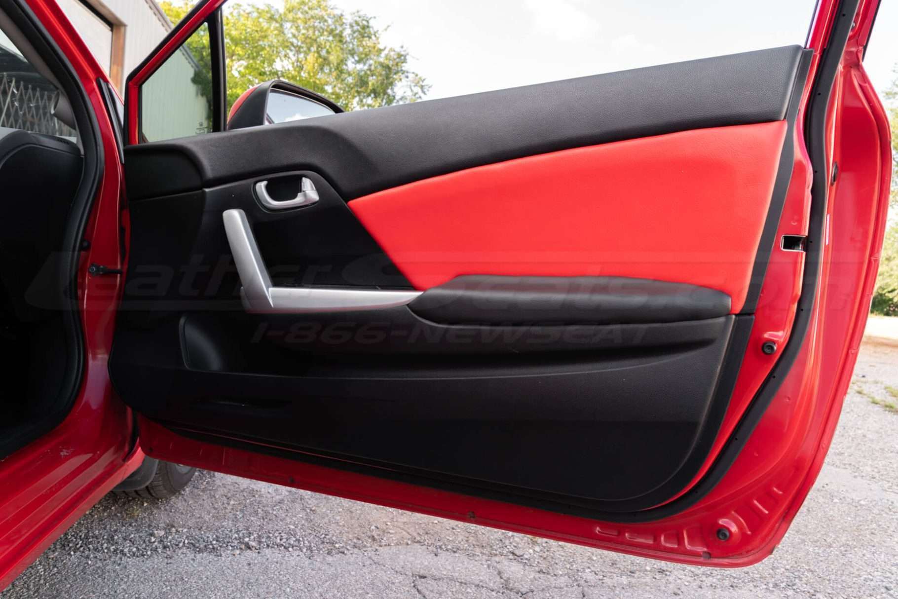 Honda Civic installed leather kit - Black & Bright Red - Door panel insert close-up
