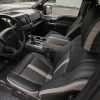 Ford F-150 installed leather kit - Black & Piazza Grey - Front driver side - headrest down view