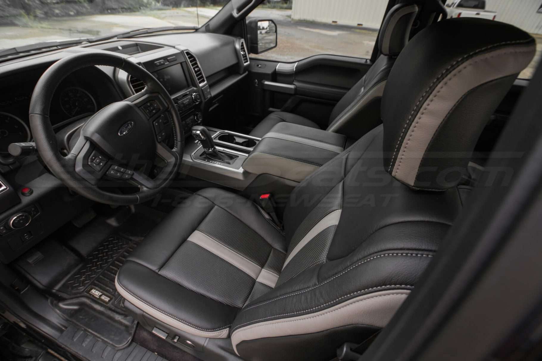 Ford F-150 installed leather kit - Black & Piazza Grey - Front driver side - headrest down view