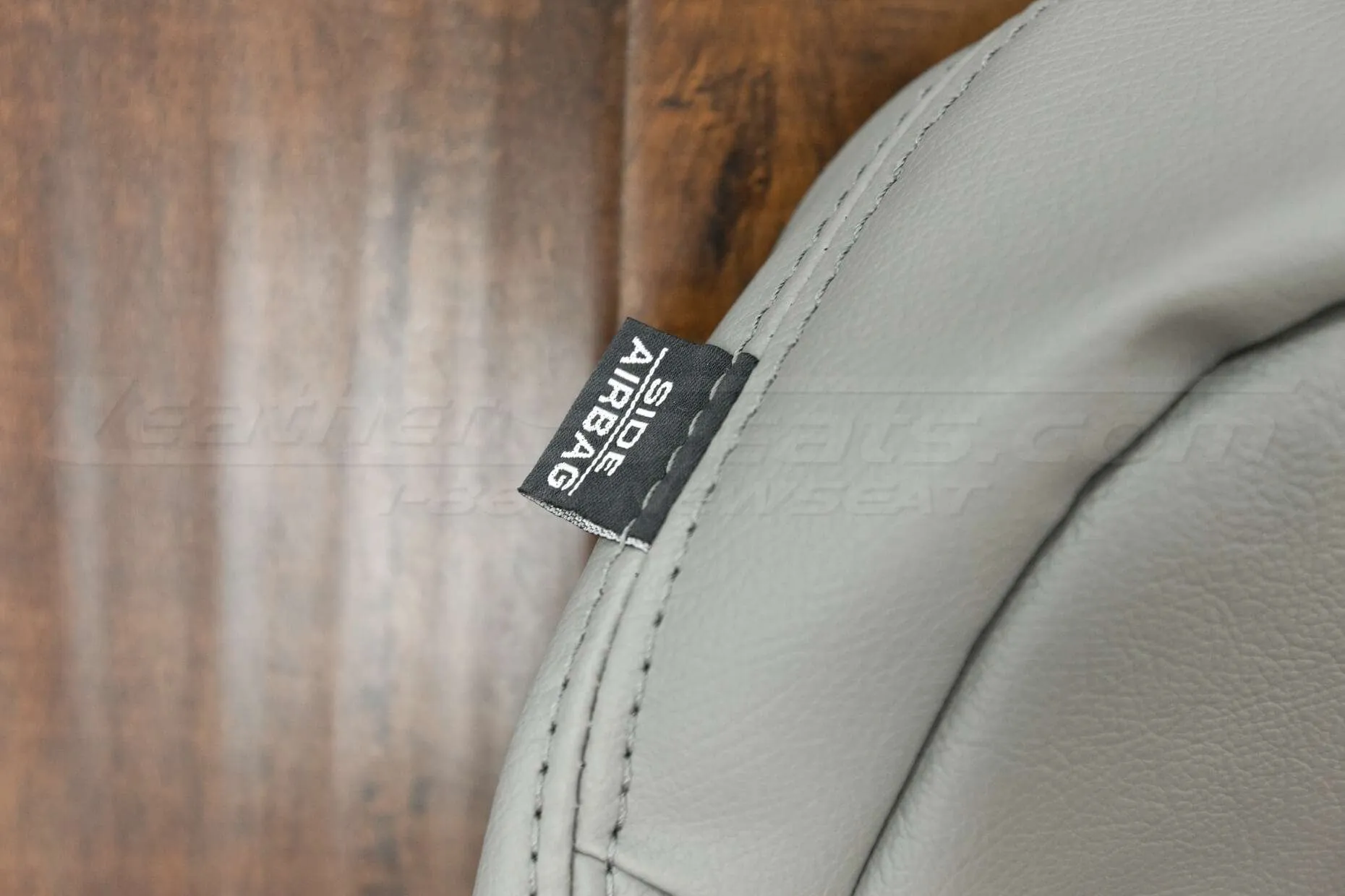 Airbag tag on backrest