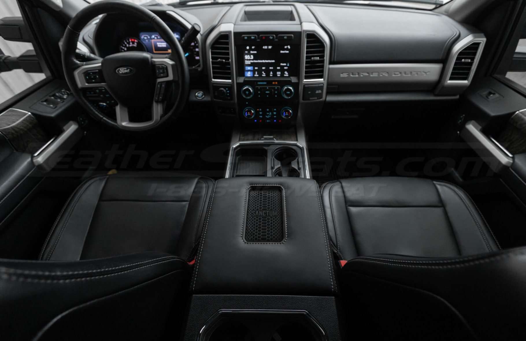 Custom Ford interior with wireless phone charging console