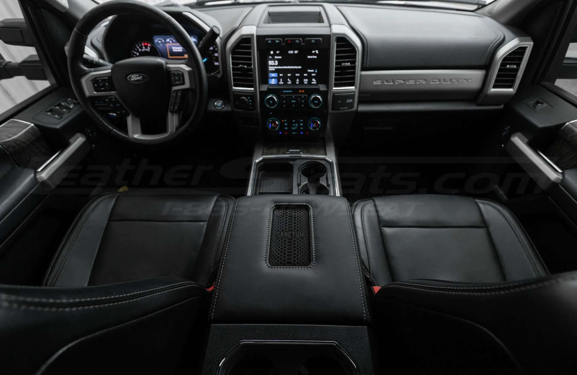 Custom Ford interior with wireless phone charging console