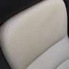 Installed 05-11 Chevrolet Corvette Leather Kit - Black & Sandstone - Perforation close up
