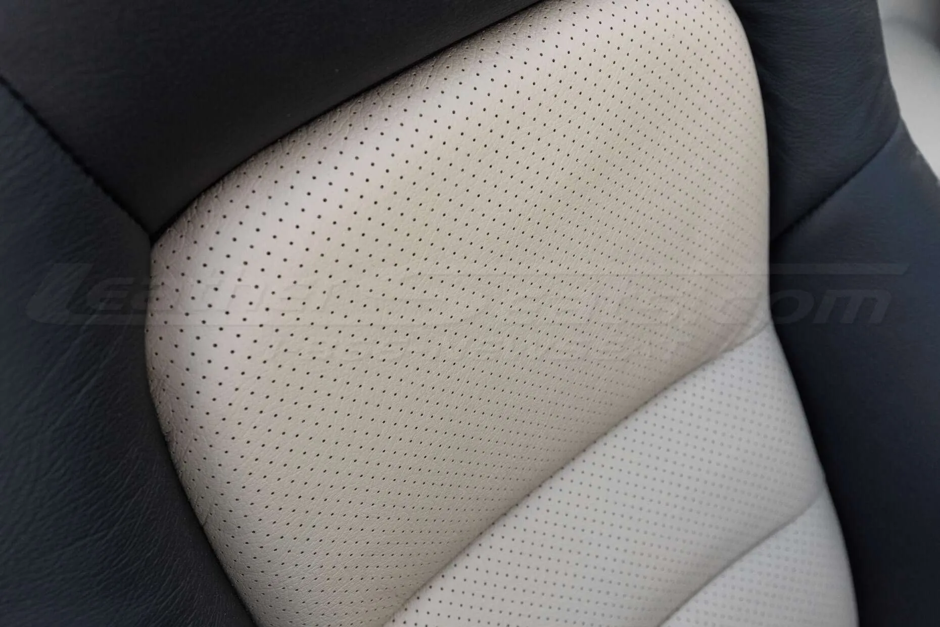 Installed 05-11 Chevrolet Corvette Leather Kit - Black & Sandstone - Perforation close up