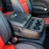 GMC Sierra leather upholstery kit - Black and Bright Red - installed - Center Console Side view
