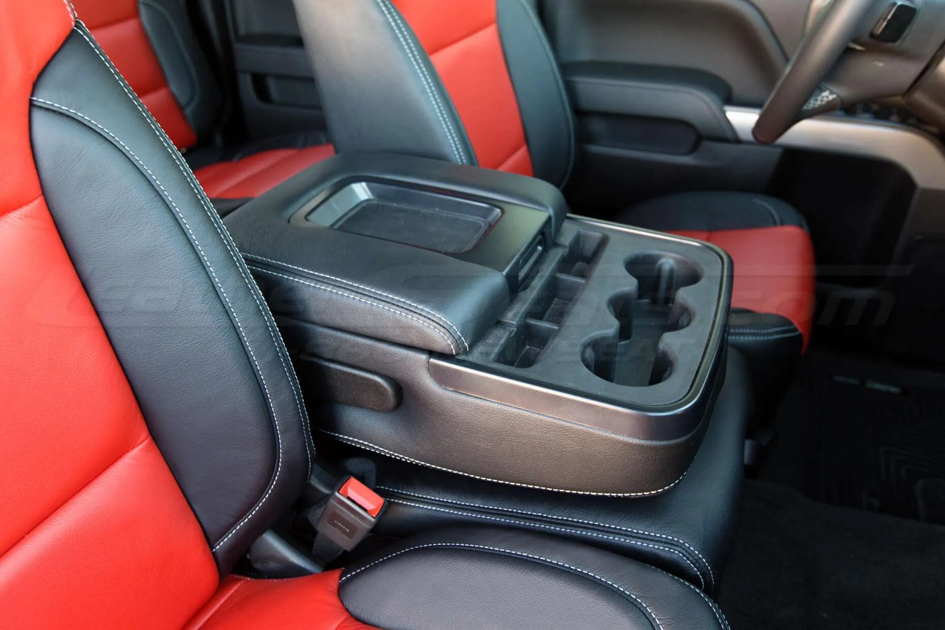 GMC Sierra leather upholstery kit - Black and Bright Red - installed - Center Console Side view