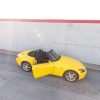Honda S2000 Black interior and Yellow exterior overhead & wide angle view