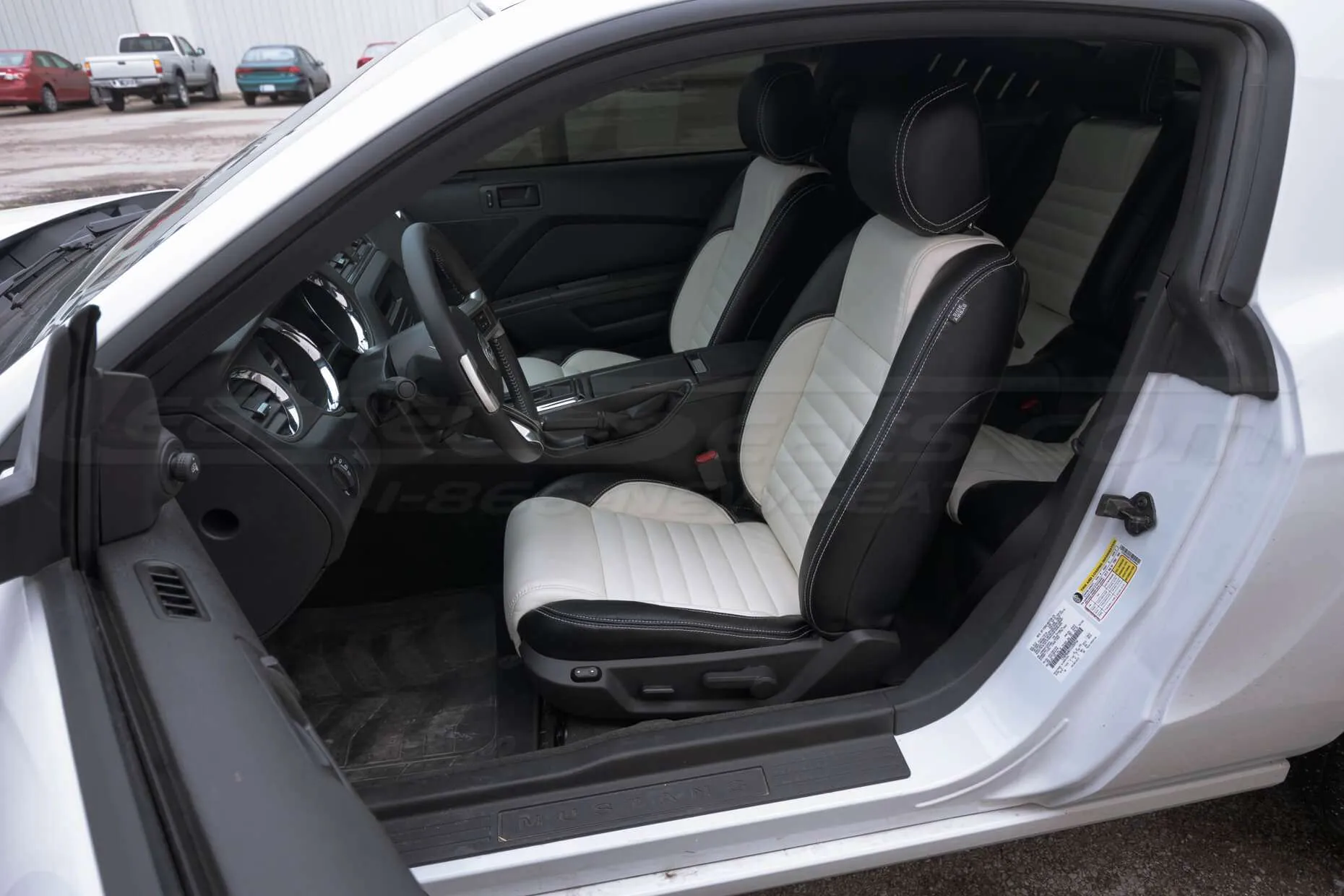 Ford Mustang installed leather kit - Black & White - Front interior drivers side wide angle