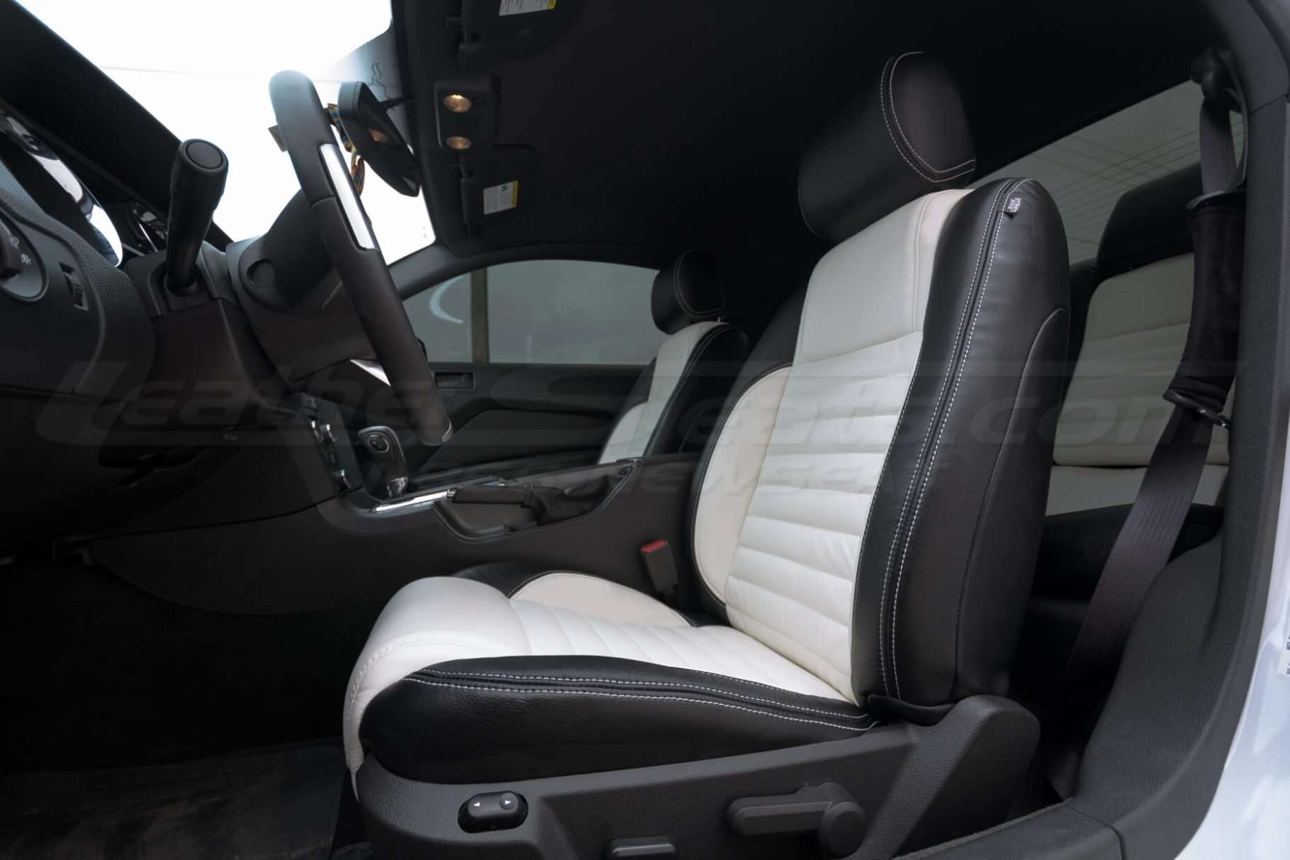 Ford Mustang installed leather kit - Black & White - Front drivers seat