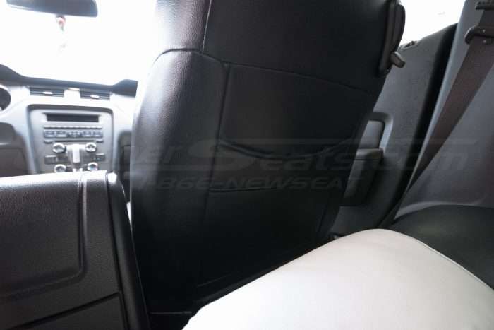 Ford Mustang installed leather kit - Black & White - Back view of front seats