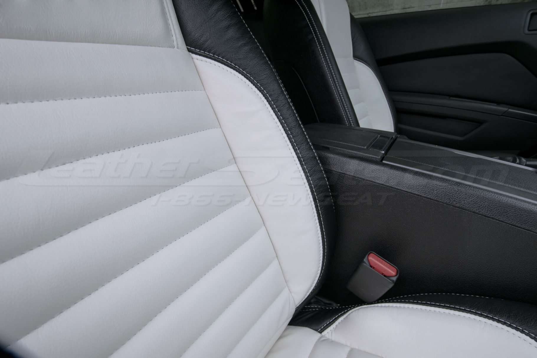 Ford Mustang installed leather kit - Black & White - Front backrest bolster & stitching