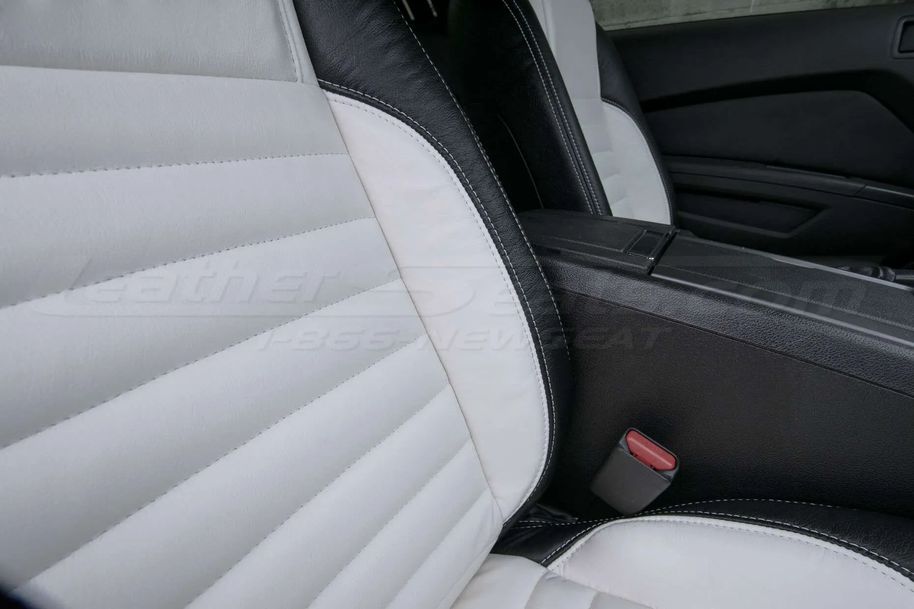 Ford Mustang installed leather kit - Black & White - Front backrest bolster & stitching