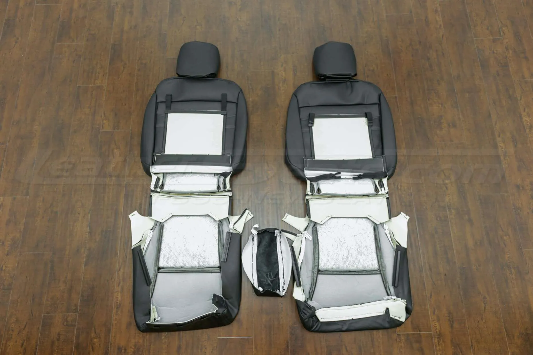 2014-2015 Honda Civic Upholstery Kit - Black - Back view of front seats and console lid cover,