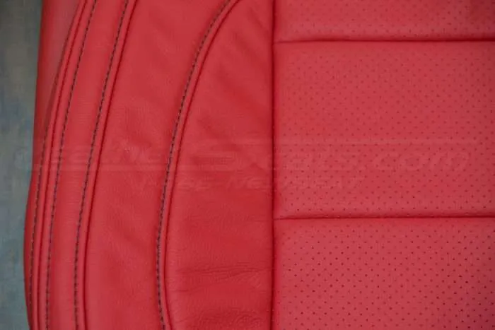Ford Mustang Bright Red Upholstery Kit - Perforation and leather comparison with double-stitching