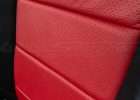 Ford Mustang installed leather kit - Black & Bright Red - Perforation close-up