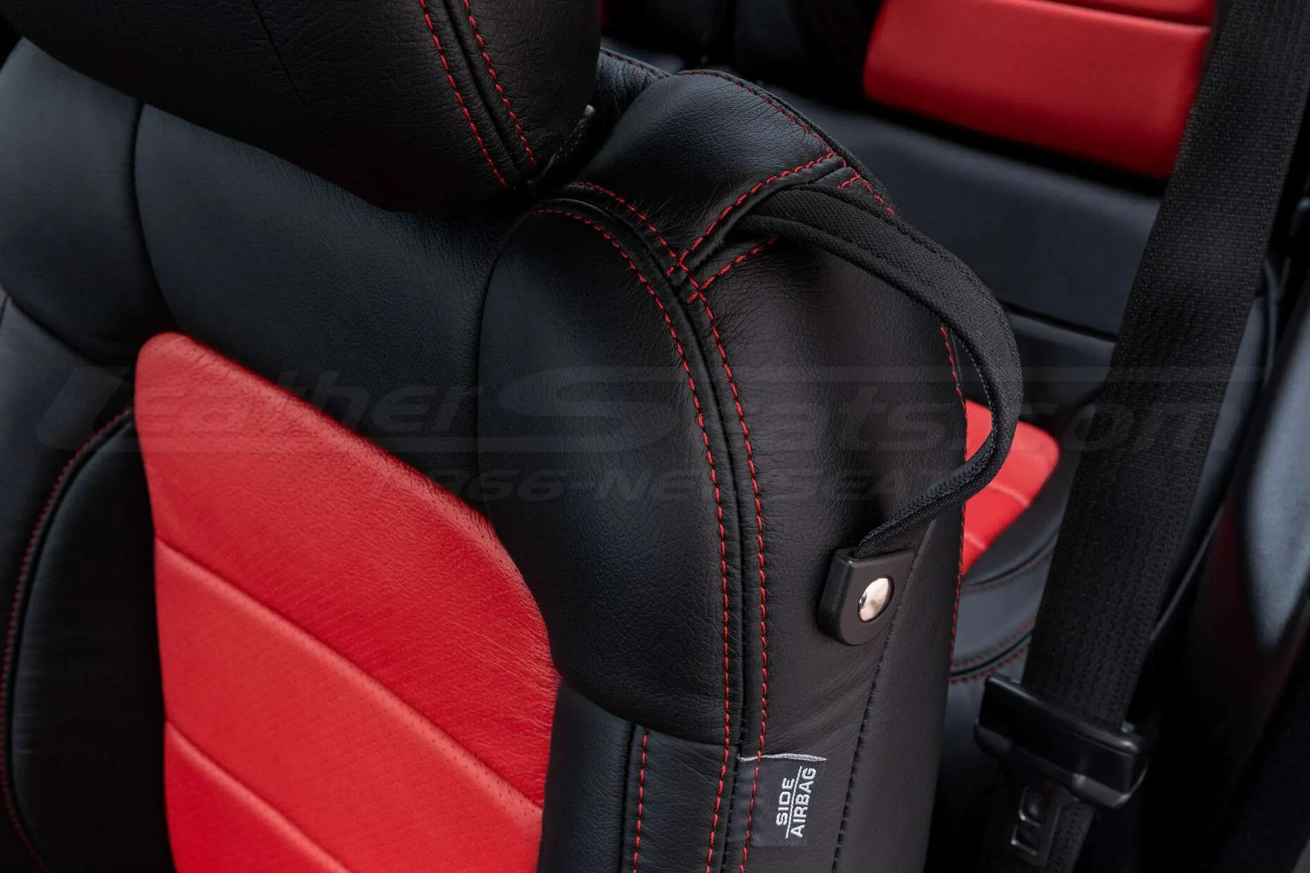 Ford Mustang installed leather kit - Black & Bright Red - Bright Red double-stitching and airbag tag