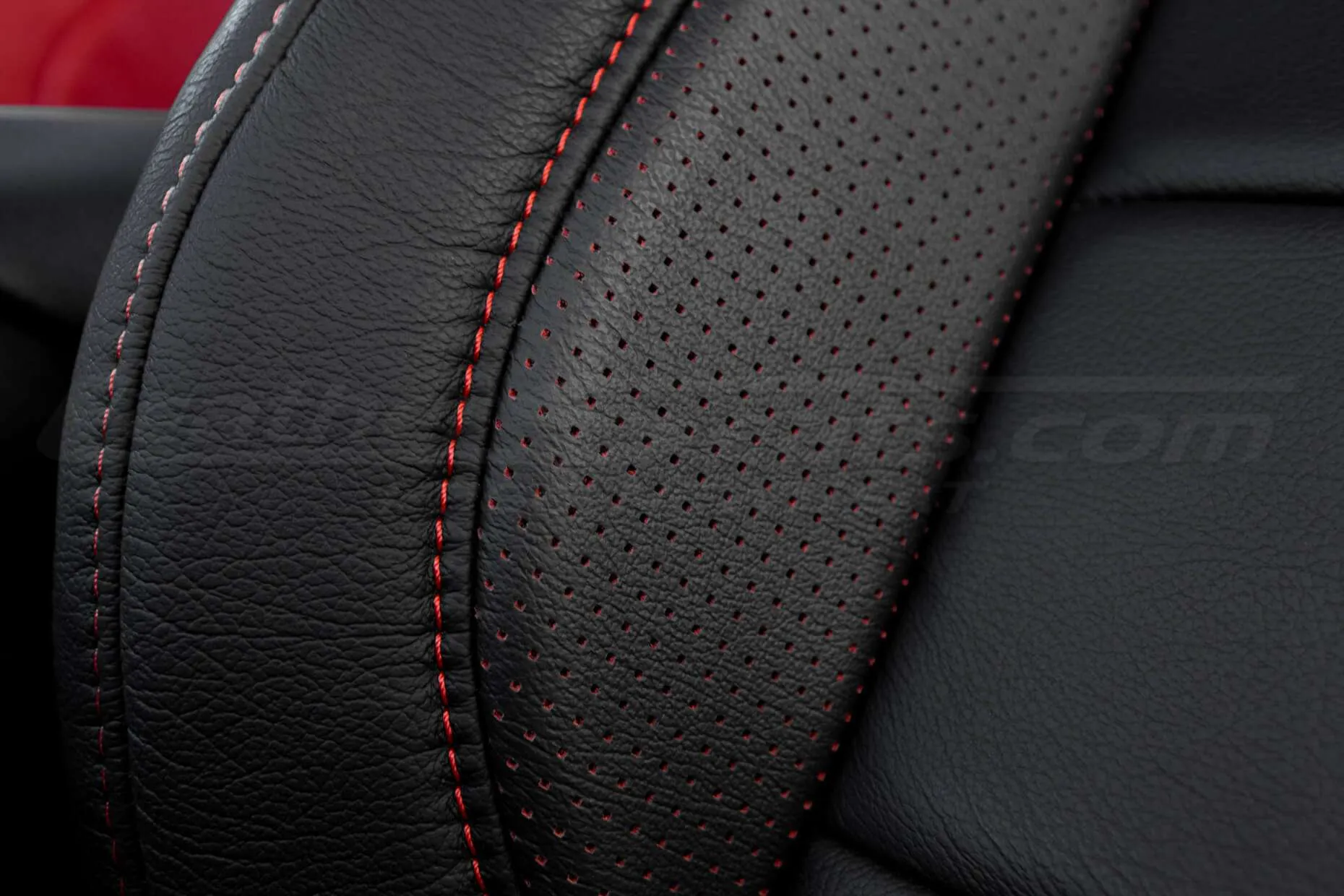 2015-2021 Ford Mustang Leather Upholstery Kit - Black & Bright Red - Installed - Wing Perforation and stitching close-up
