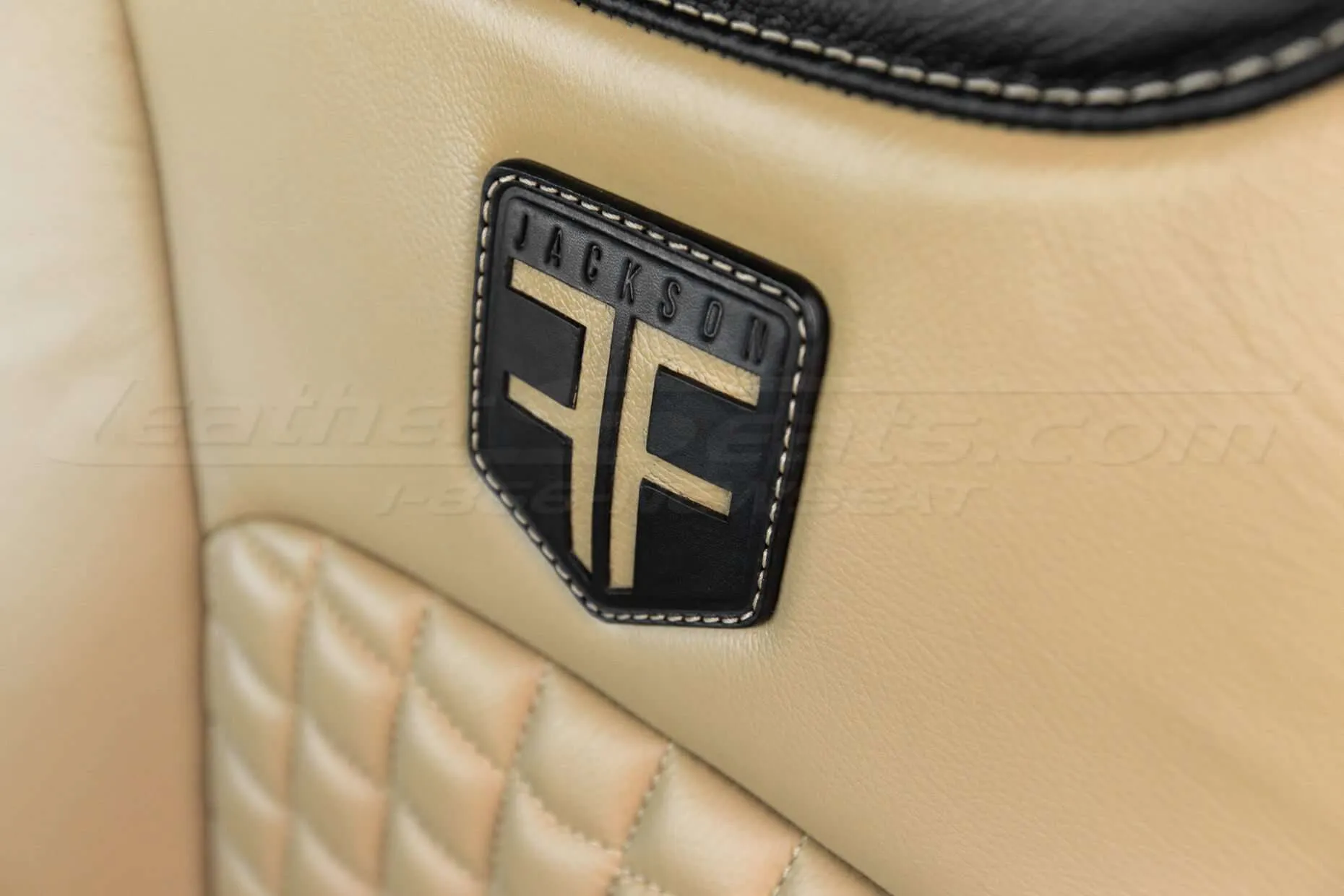 Quadrata Ford Superduty install - Back & Bisque - Seat logo close-up