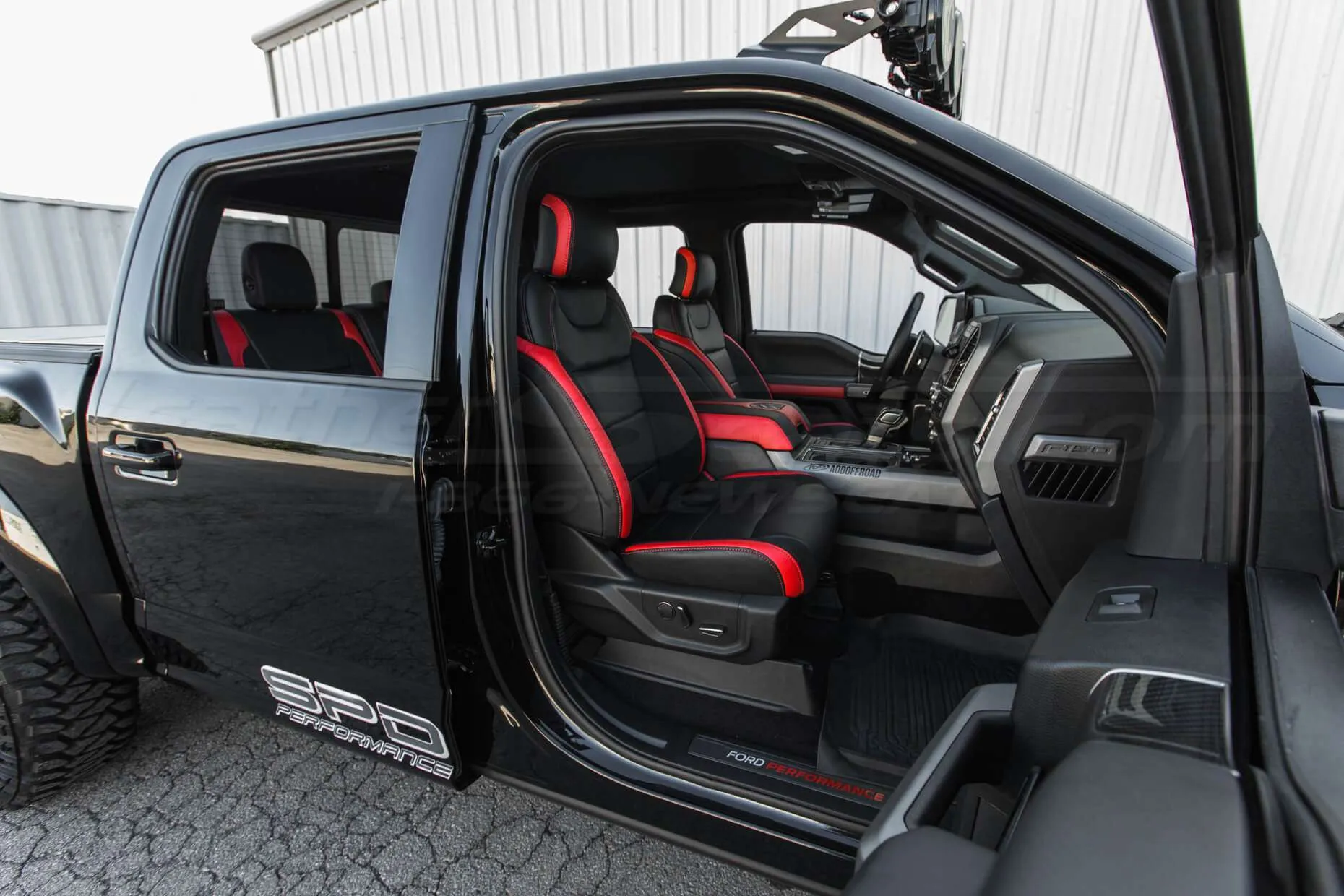 Ford Raptor installed upholstery kit - Black & Bright Red Passenger seat wide angle
