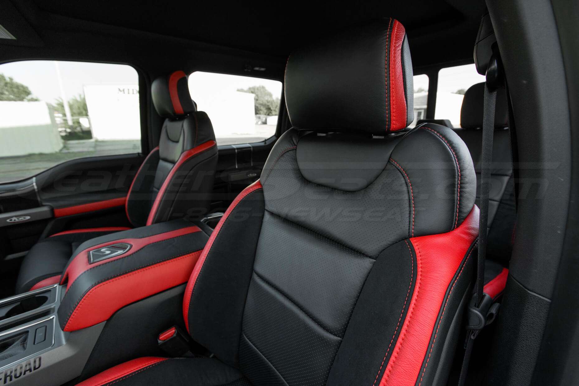 Ford Raptor installed upholstery kit - Black & Bright Red - Backrest and headrest close-up