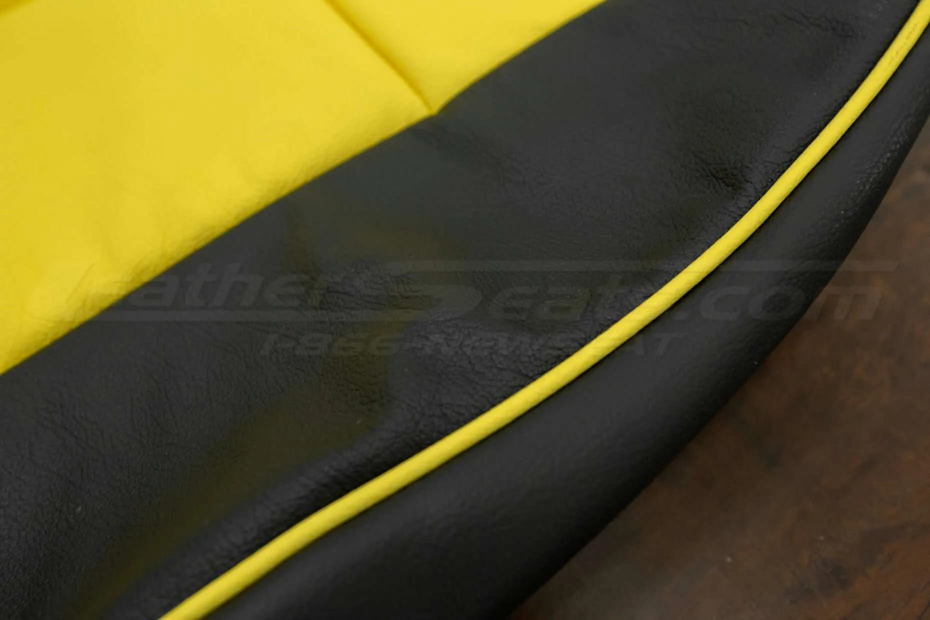 Side Velocity Yellow piping on backrest