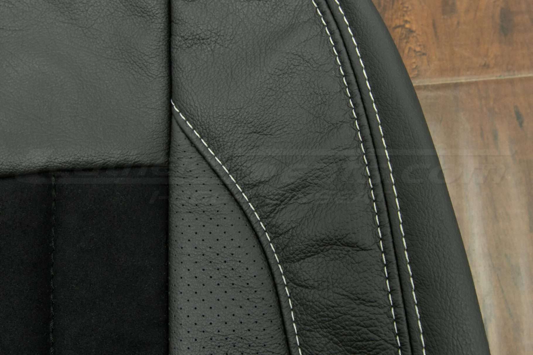 Perforated wings and white double-stitching