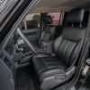 Jeep Liberty installed leather kit - Black - Front interior drivers side view