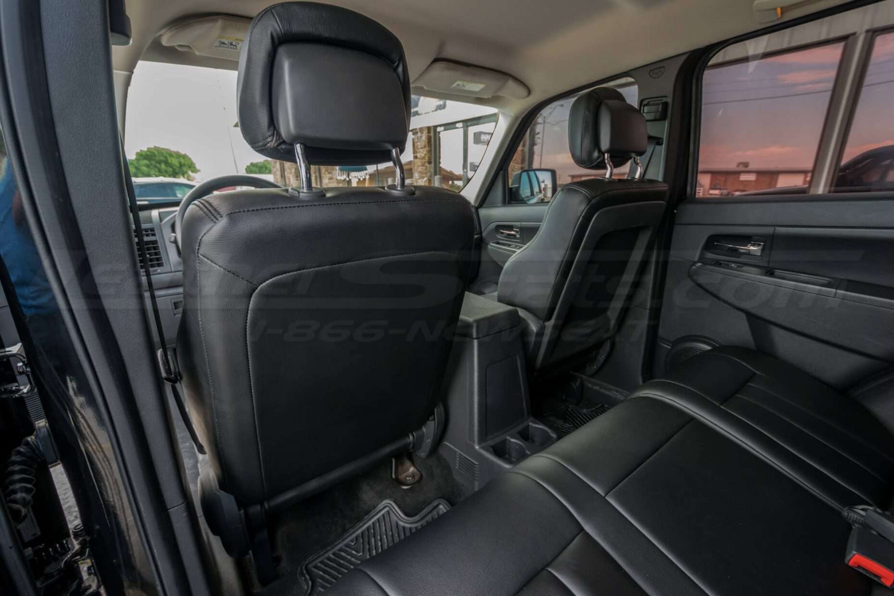 Jeep Liberty installed leather kit - Black - Back view of front seats
