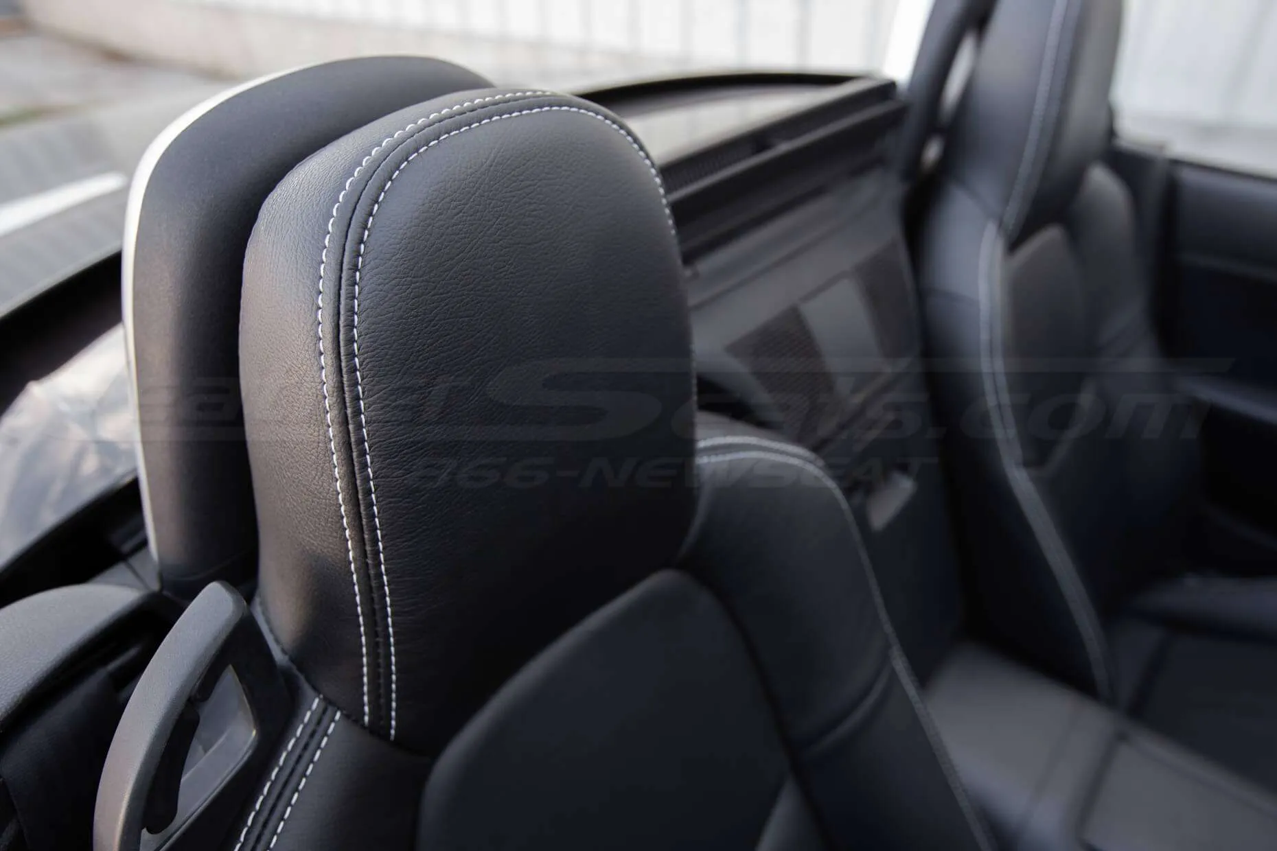 Mazda Mazda Miata Installed Leather - Black - Front passenger headrest double-stitching focus