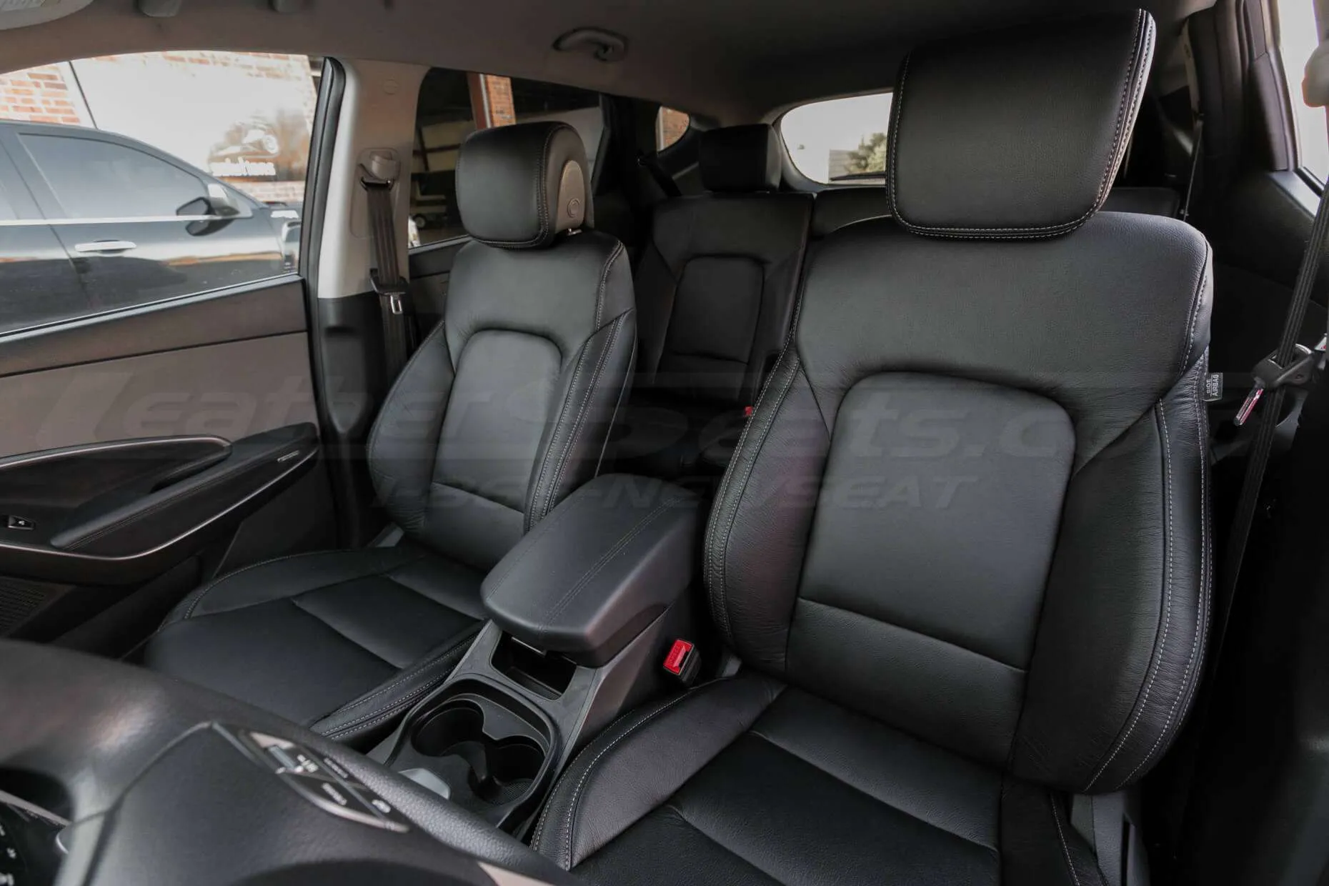 Hyundai Santa Fe Sport installed leather kit - Black - Front interior