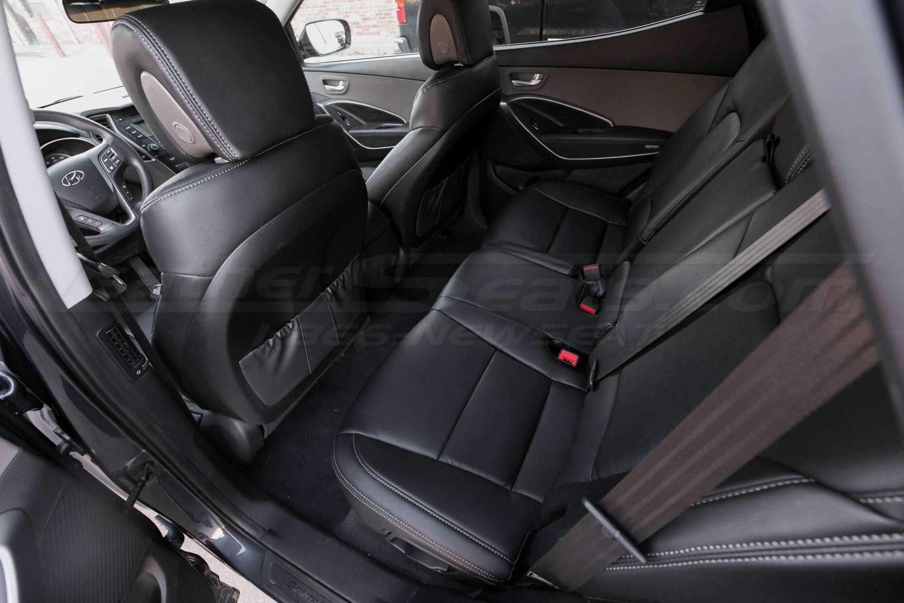 Hyundai Santa Fe Sport installed leather kit - Black - Rear seats with back of front seats