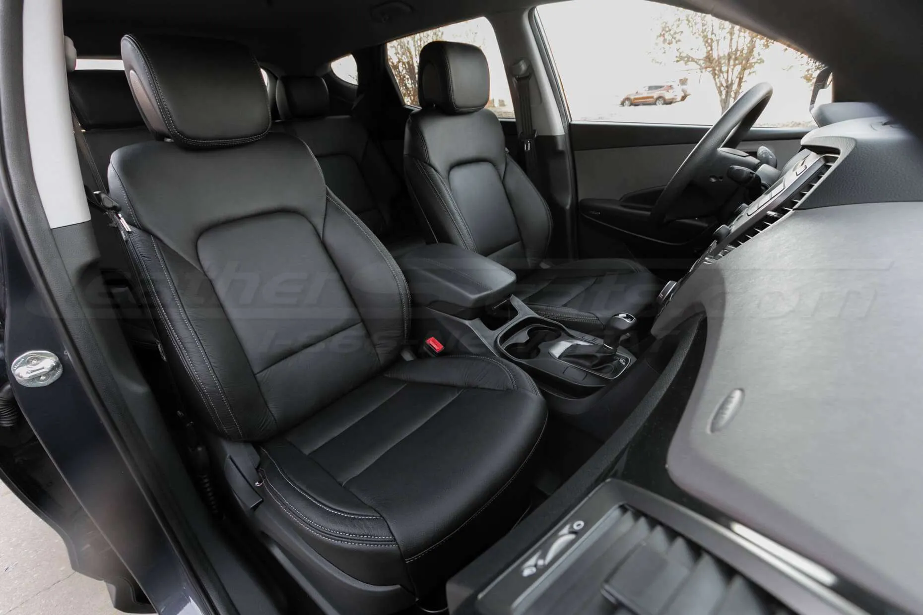 Hyundai Santa Fe Sport installed leather kit - Black - Front interior from passenger side