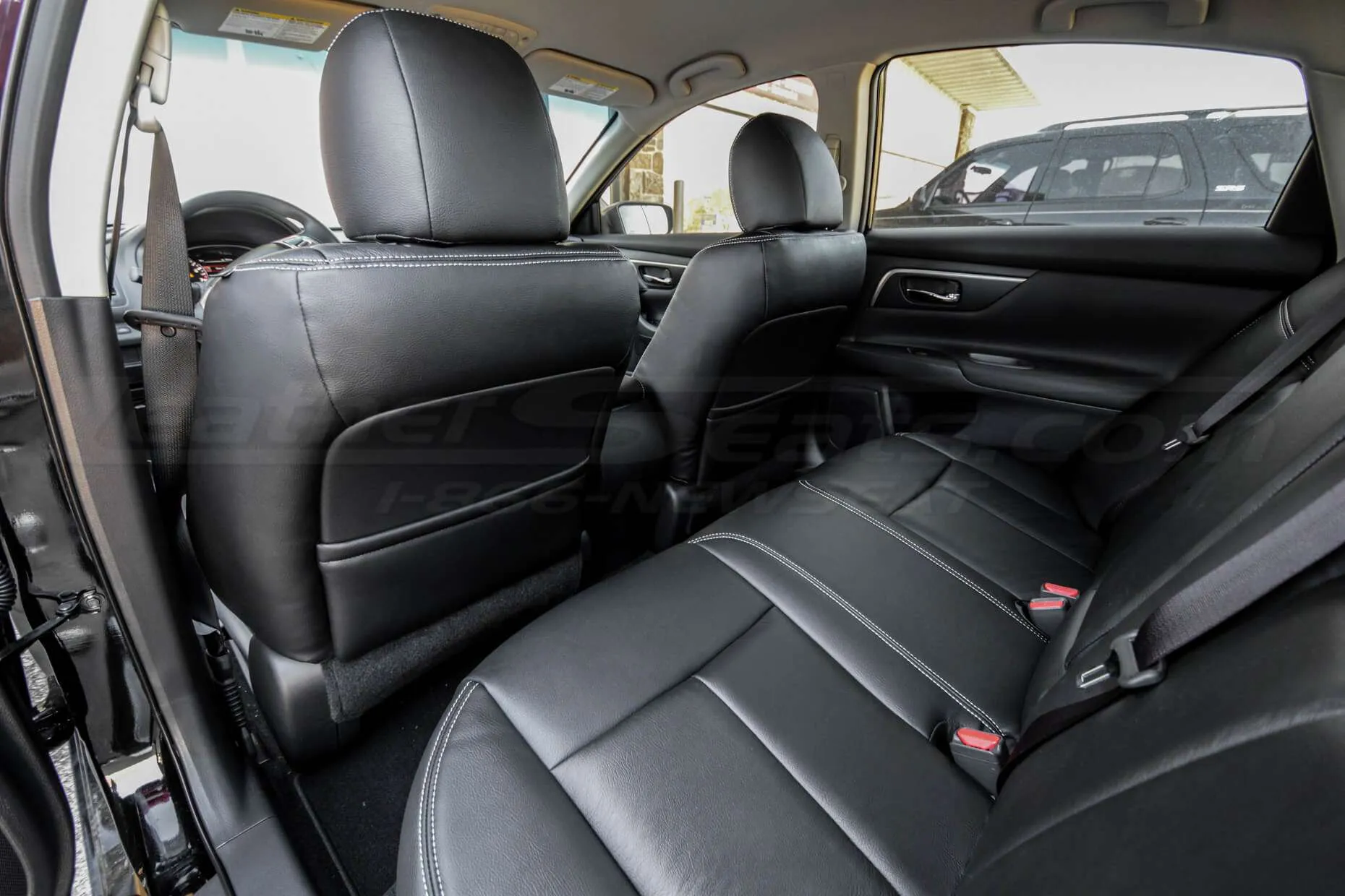 2013-2018 Nissan Altima - Single Tone Black w/ Silver stitching - Back view of front seats