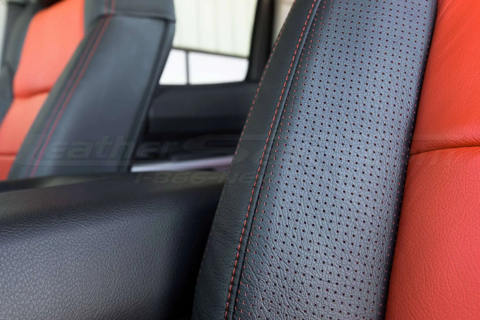 Toyota Tundra Leather Kit Installed - Black & Bright Red - Perforated wing close-up 2