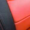 Toyota Tundra Leather Kit Installed - Black & Bright Red - Insert & perforated wing close-up