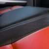 Toyota Tundra Leather Kit Installed - Black & Bright Red - Seat cushion wing close-up