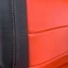 Toyota Tundra Leather Kit Installed - Black & Bright Red - Front backrest double-stitching