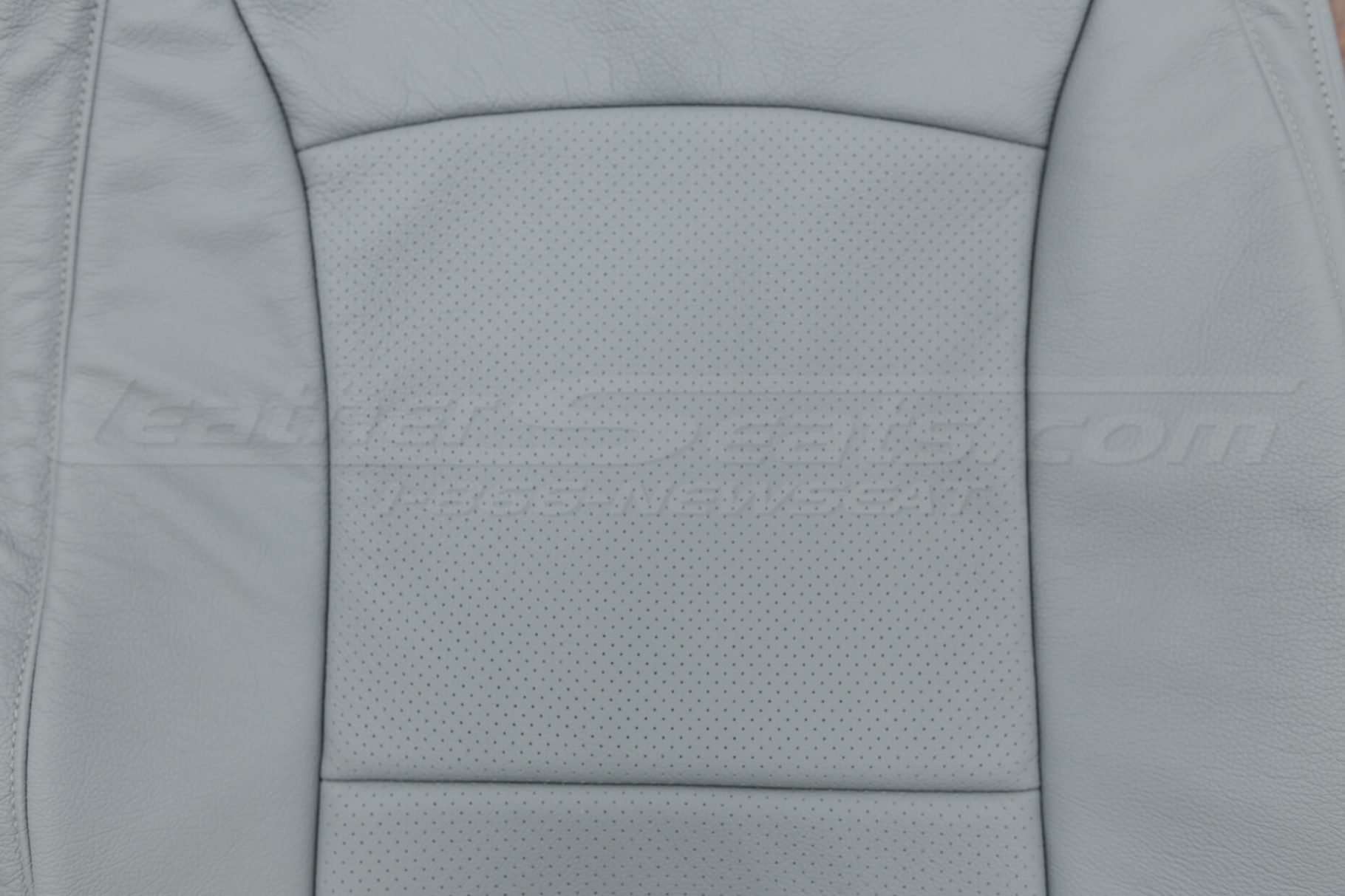 Perforated inserts on backrest