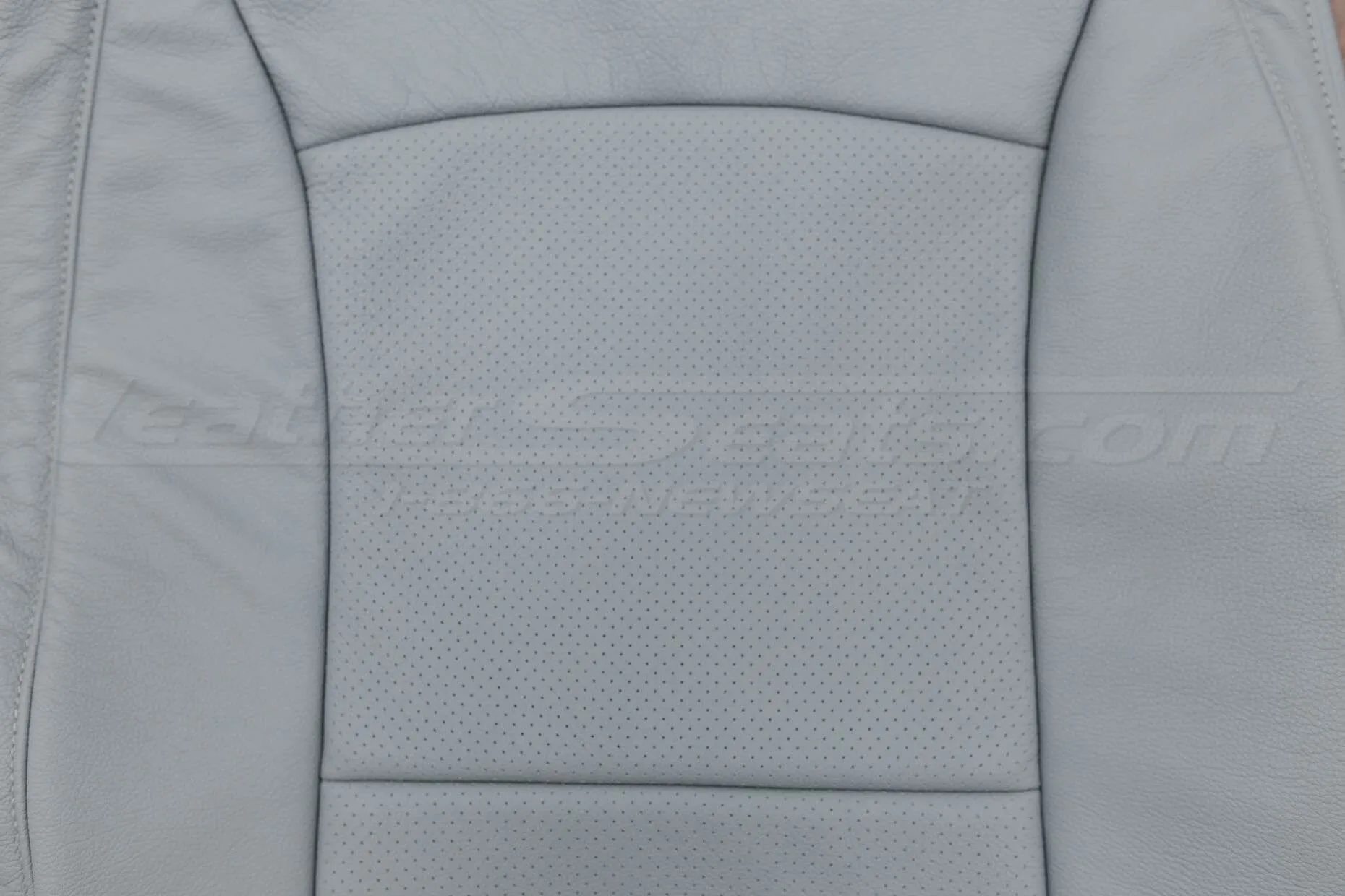 Perforated inserts on backrest