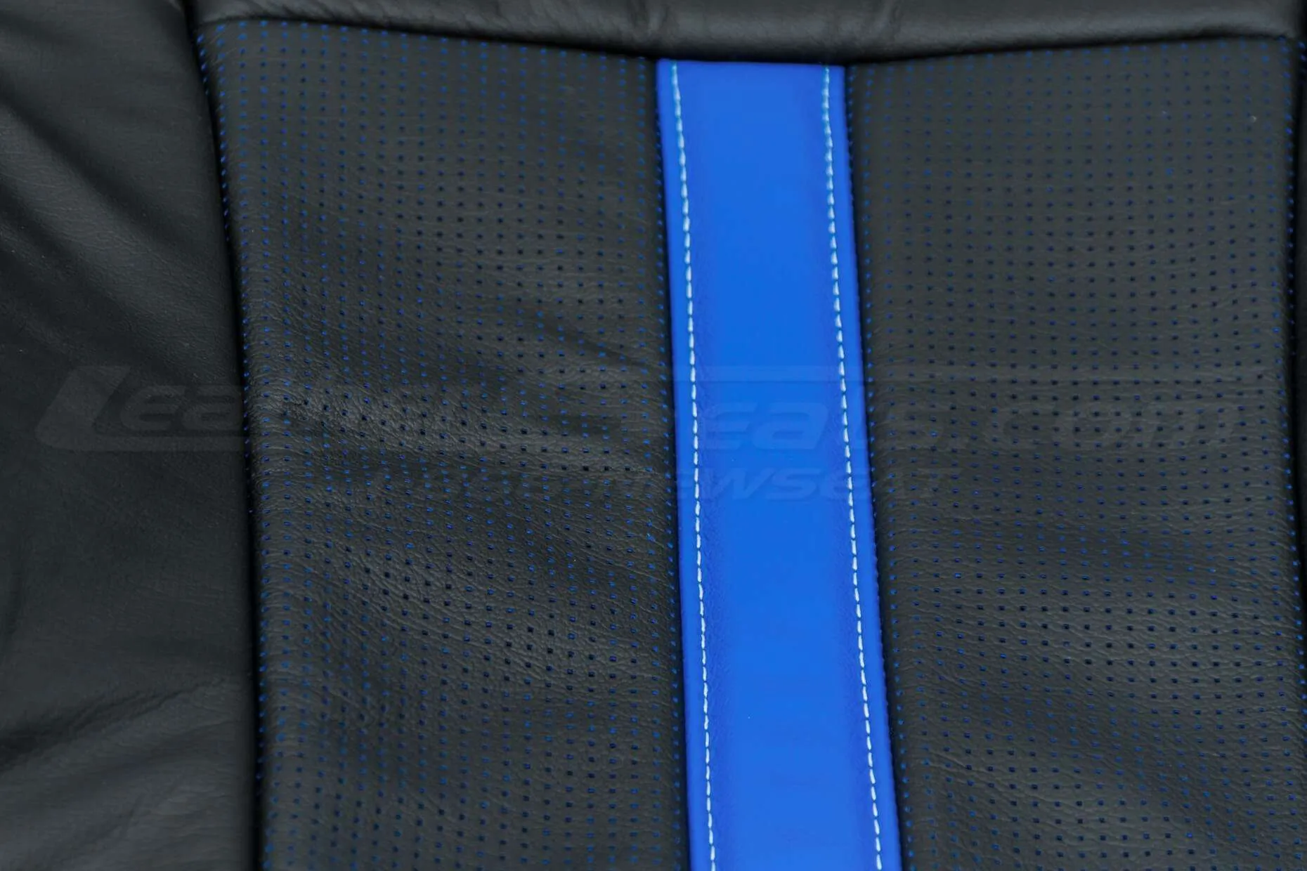 Ford F-150 Upholstery Kit - Installed - Black & Piazza Blue - Perforation closeup & leather texture difference.