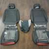 Ford F-150 Upholstery Kit - Black & Red - Back view of front seats with console