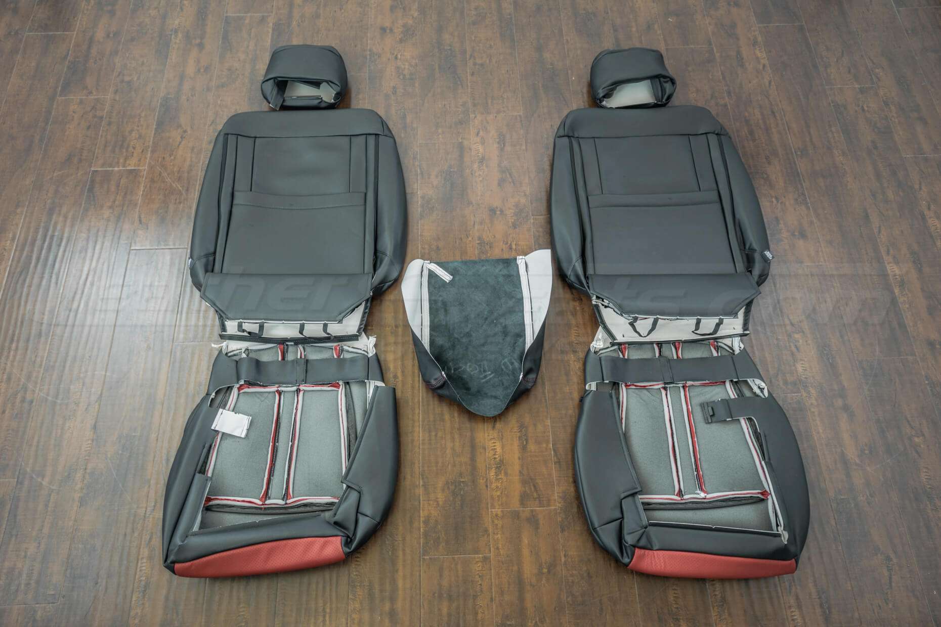 Ford F-150 Upholstery Kit - Black & Red - Back view of front seats with console