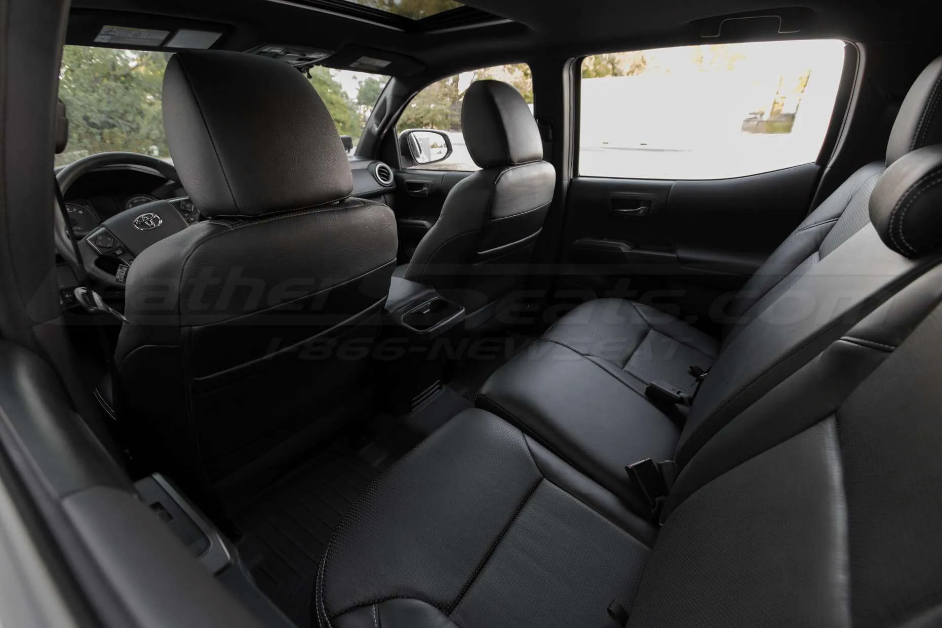2016-2020 Toyota Tacoma Leather Seats - Black - Installed - Back view of front seats