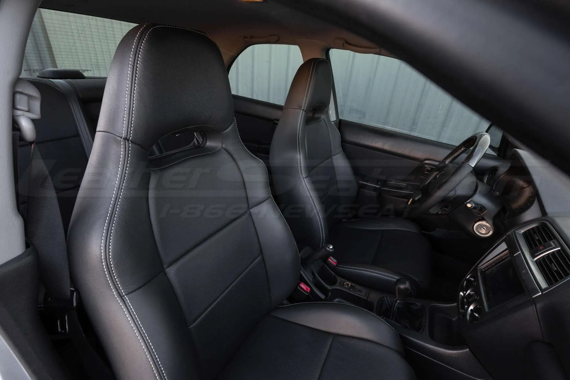 Subaru Impreza WRX Dark Graphite Leather Seats - Front interior from passenger sid e