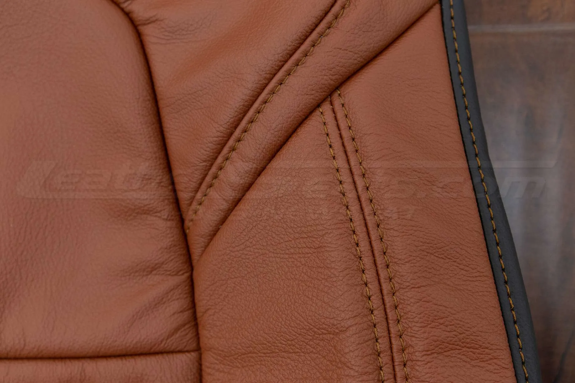 Leather upholstery double-stitching close-up