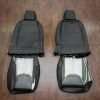 Jeep Wrangler Leather Seats - Black & Piazza Green - Back view of front seats