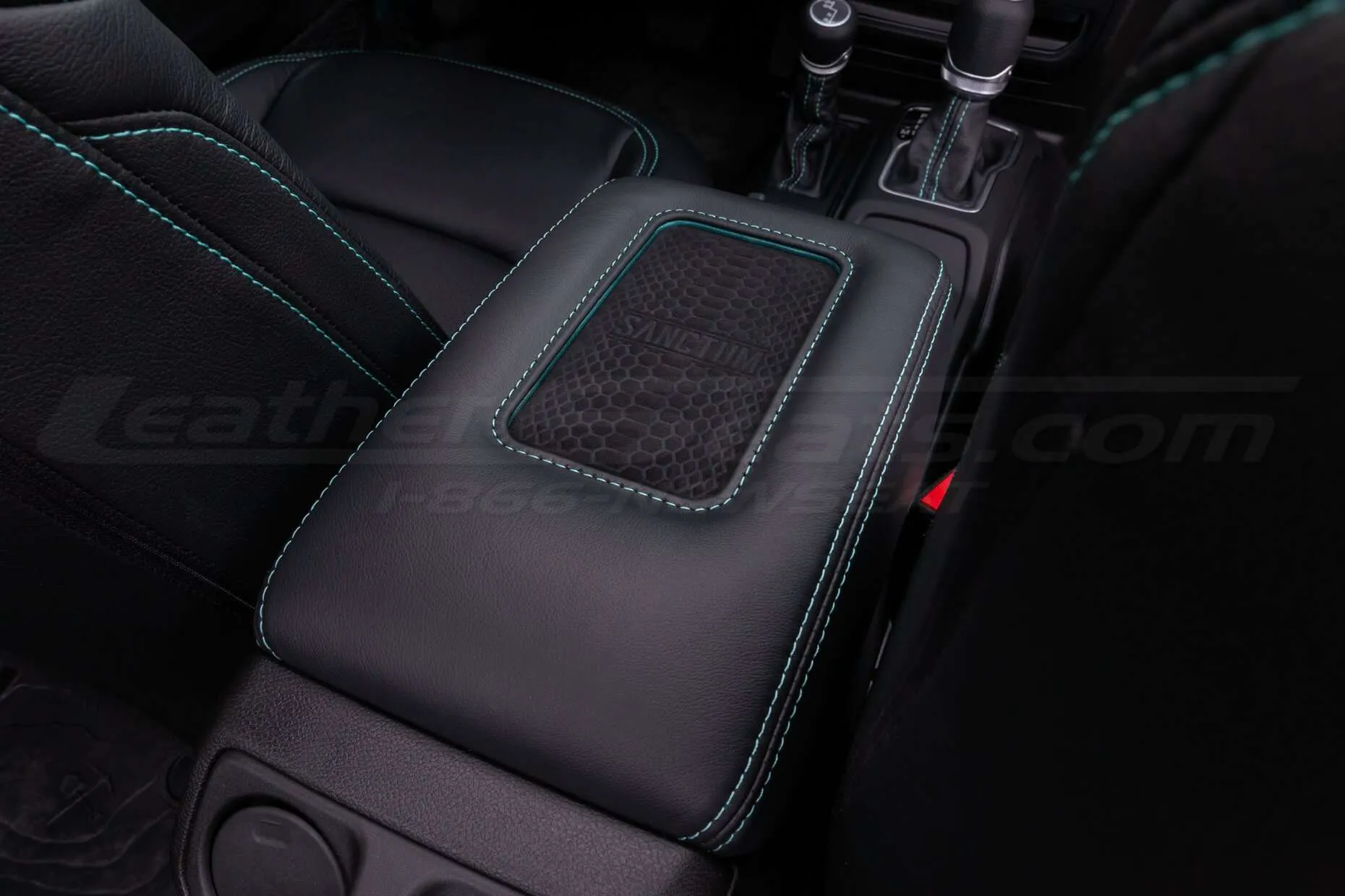 Jeep Wrangler JL Upholstery Kit - Black - Installed - Sanctum wireless charging console close-up
