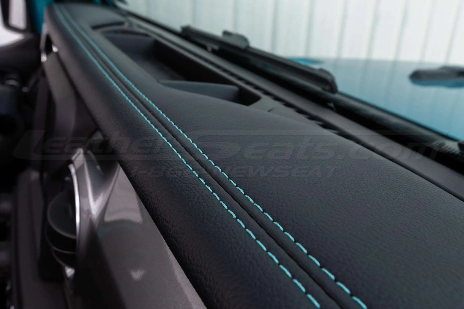 Jeep Wrangler JL Upholstery Kit - Black - Installed - Dashboard cover turquoise double-stitching close-up