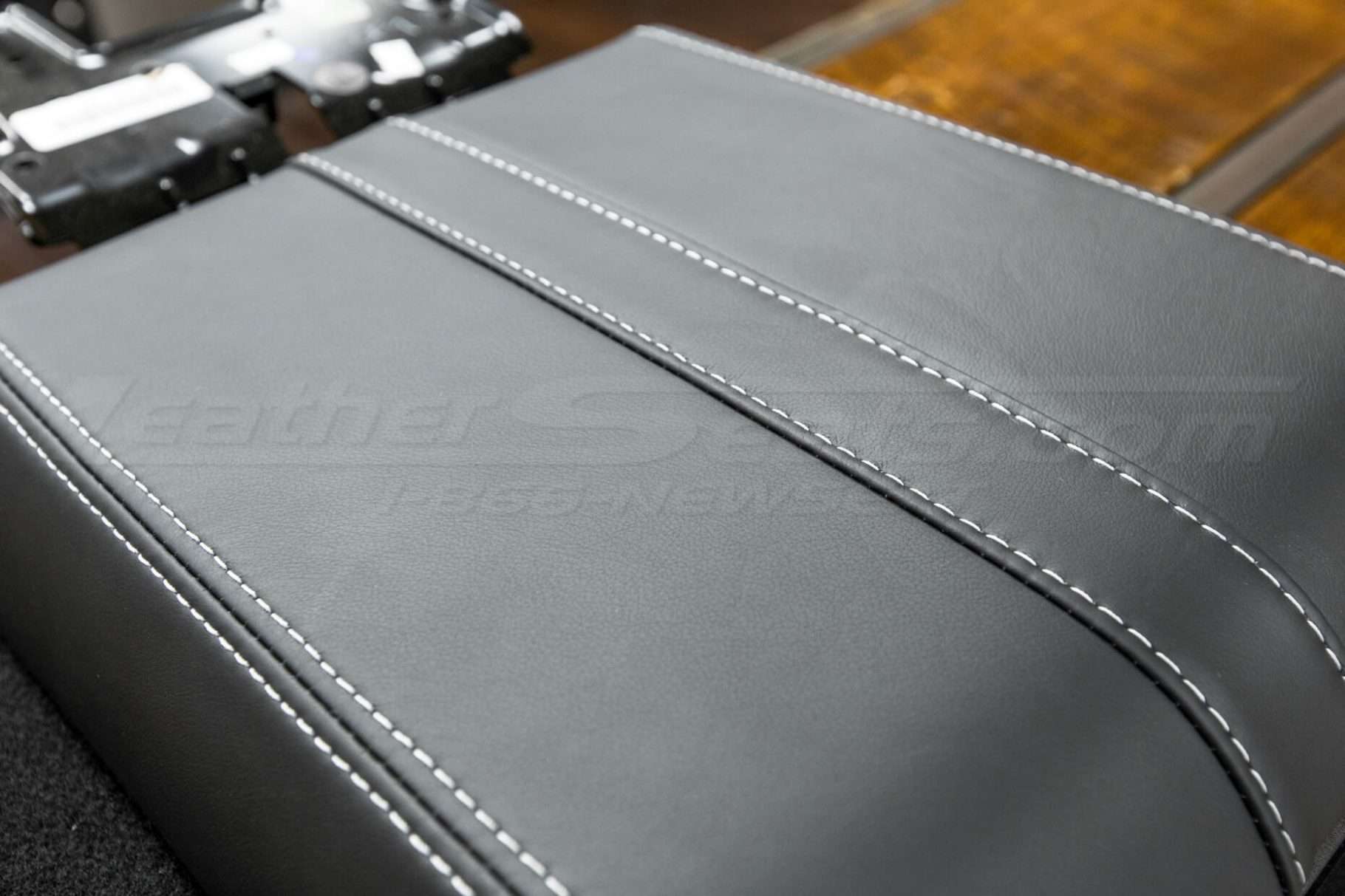 Ford F-150 Console Lid Stitching close-up;